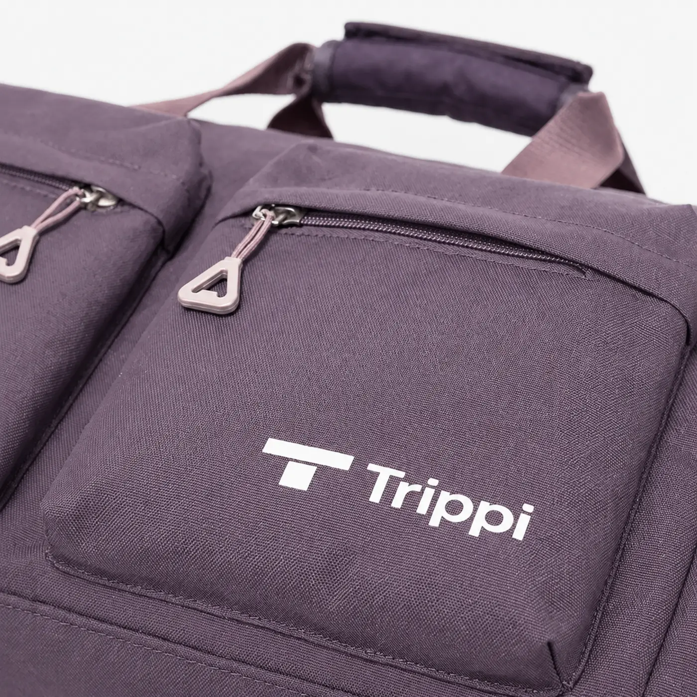 Close view of purple TTrippi fabric and logo